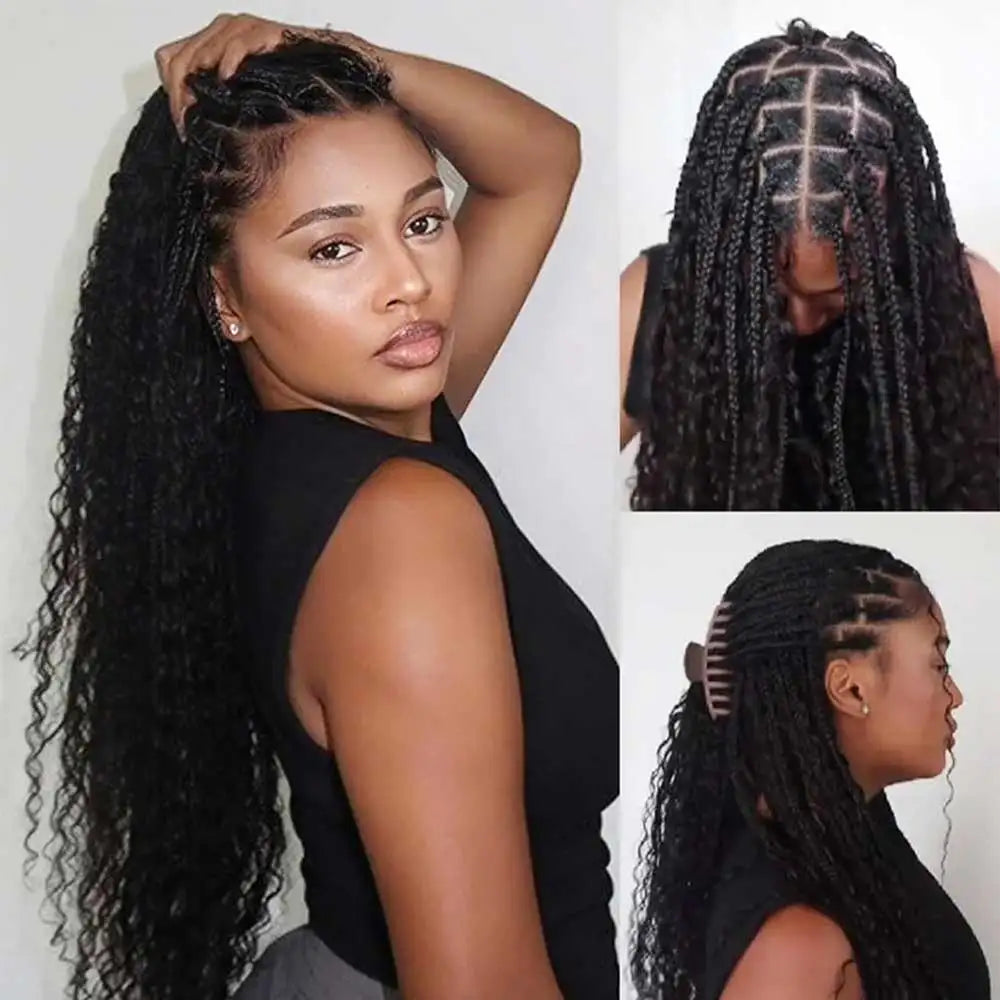 A woman models long black kinky straight human hair extensions styled in boho braids.