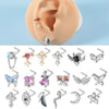 A collection of surgical steel demon angel nose studs in various designs and materials.