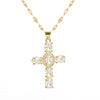 A gold-toned stainless steel cross necklace featuring clear, brilliant-cut gemstones.