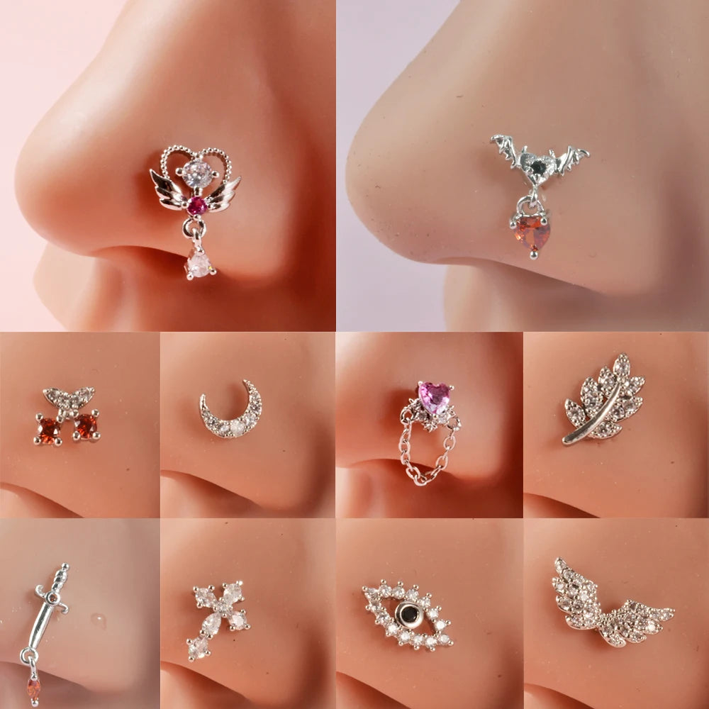 Silver surgical steel demon angel nose studs in various designs and sizes