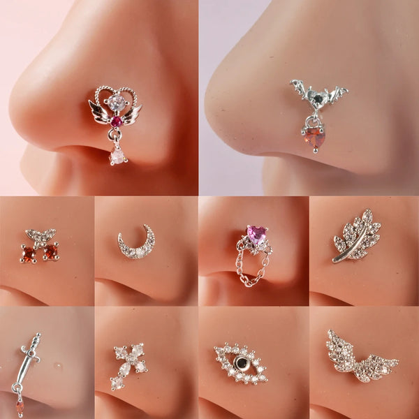 Silver surgical steel demon angel nose studs in various designs and sizes