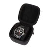 Black leather watch travel case organizer with an open lid displaying a wristwatch.