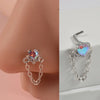 Silver surgical steel demon angel nose studs featuring iridescent pink and blue gemstones
