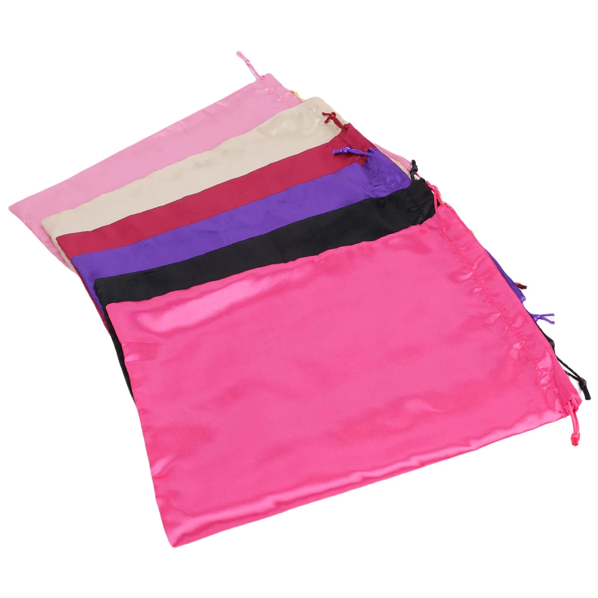A set of three pink satin drawstring storage pouches in various shades of pink and purple.