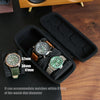 A black leather watch travel case organizer holding several watches with various dial diameters.