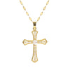 A gold-toned stainless steel cross necklace with a detailed design and chain.