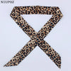 A black and brown leopard print silk headband or scarf tied in an 'X' shape.