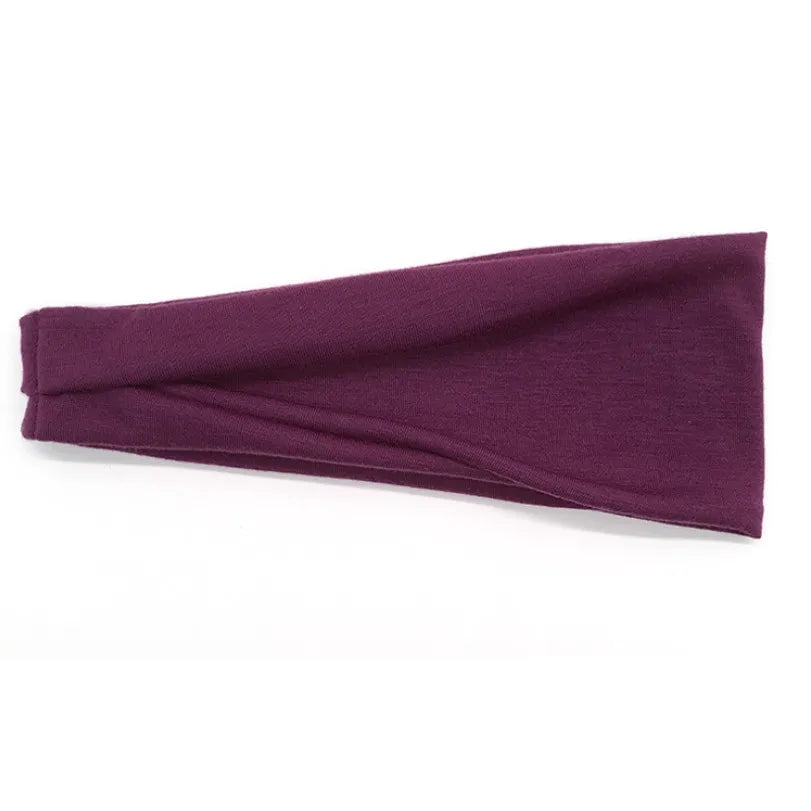 Nahaufnahme eines tiefvioletten Baumwoll-verdrillten Stirnbandes.