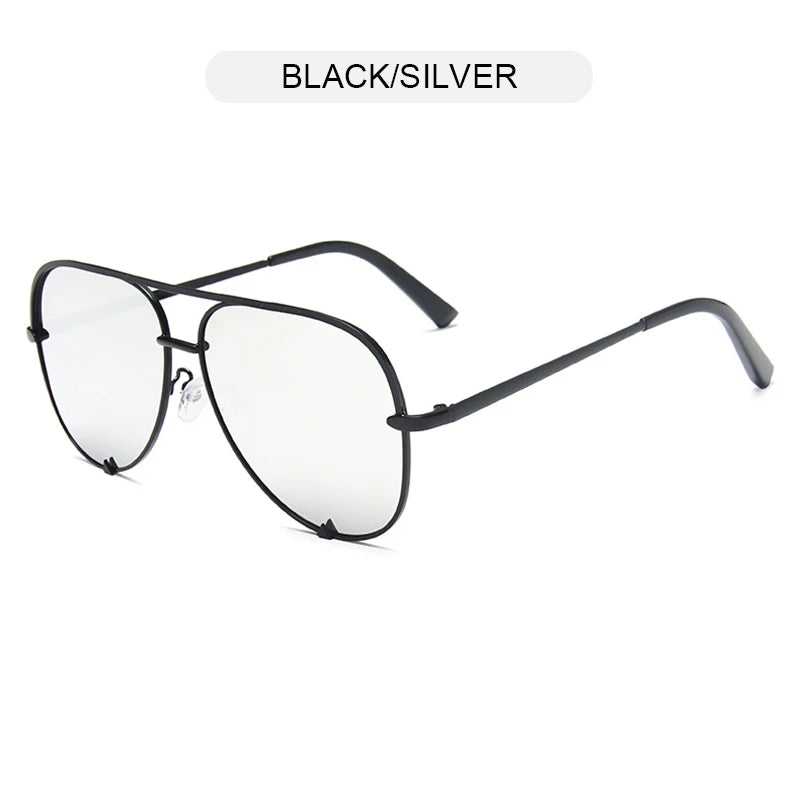Black and silver aviator sunglasses with a gradient lens shown against a white background.