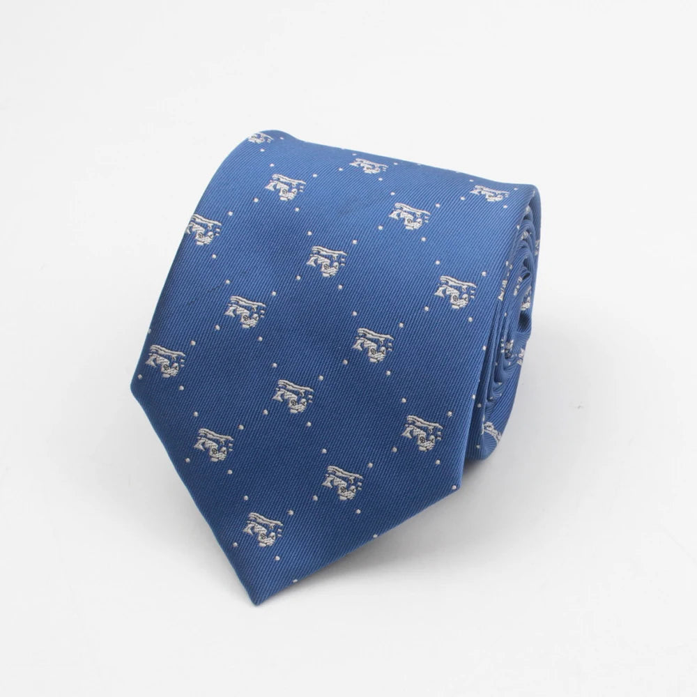 A blue necktie with a subtle pattern of white stripes and dots.