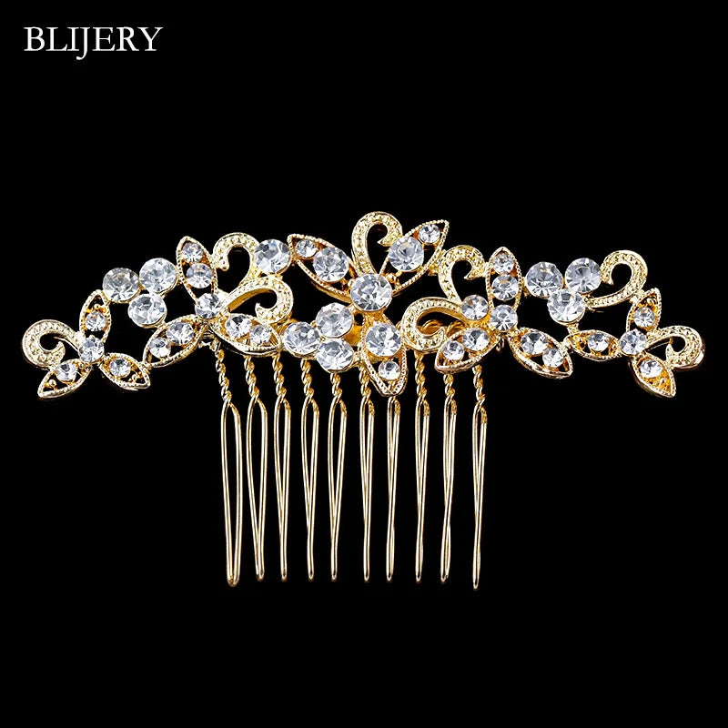 A gold-toned bridal hair comb tiara adorned with clear rhinestones and dangling strands.