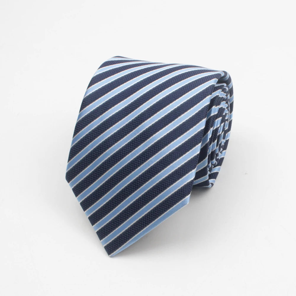 A folded blue and white striped necktie with a subtle dot pattern.