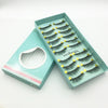 A box of handmade 3D mink false eyelashes with various styles displayed inside.