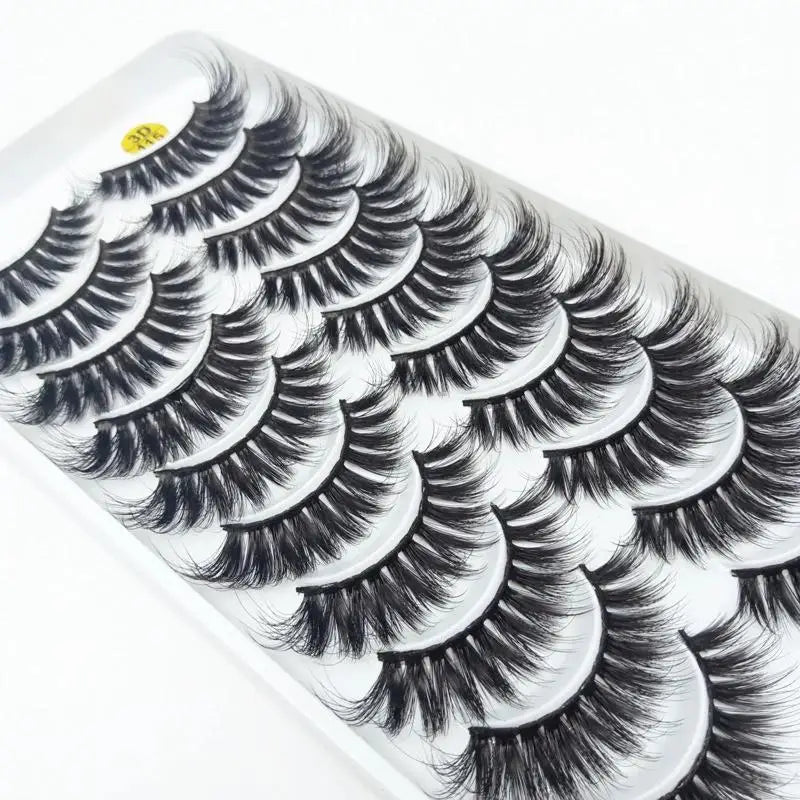 Close-up of a pair of dramatic mink false eyelashes applied to a model's eye.