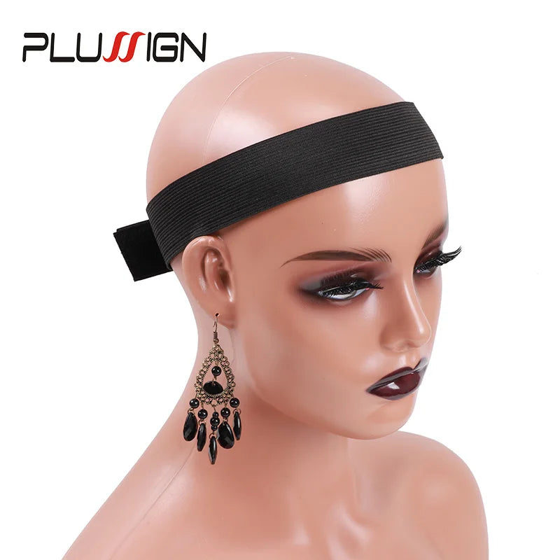 A mannequin head displaying an adjustable lace wig edge band and a dangling earring.