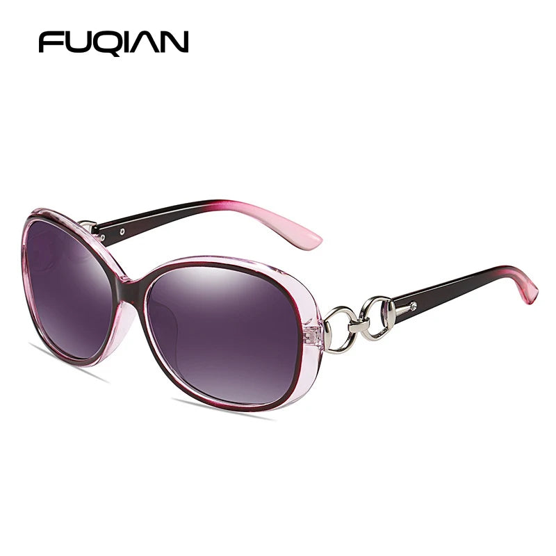 Rosa getönte, oversized Sonnenbrille mit goldener Kettendetail.