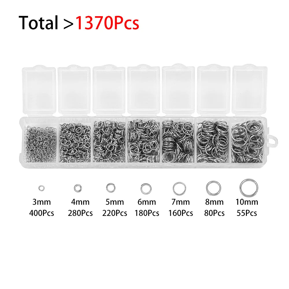 Clear plastic storage box containing various sized jewelry findings like clasps, hooks, and jump rings.