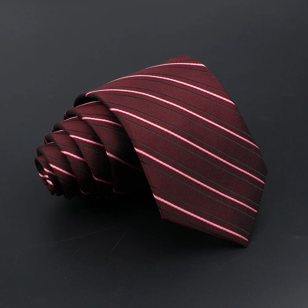 A dark burgundy men's tie featuring thin, diagonal pink stripes rolled into a knot.