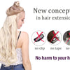 A blonde woman shows off long, wavy hair extensions with a braid and clip on a display background.