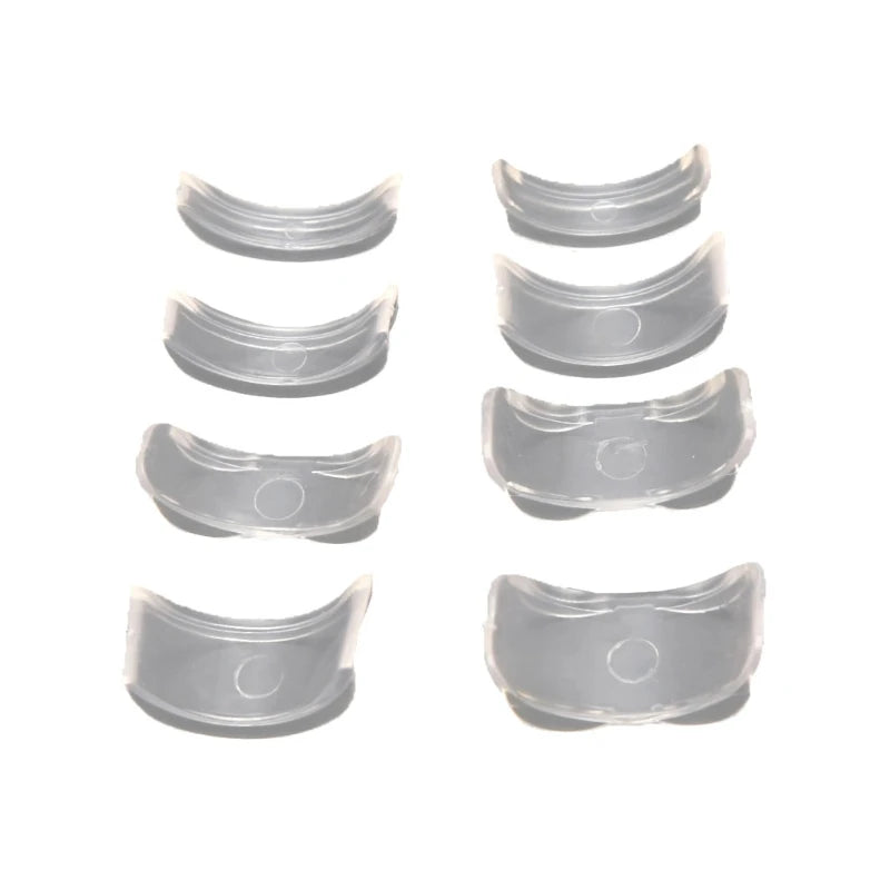 A set of clear silicone rings used for adjusting ring size.