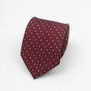 A maroon necktie with a small red dot pattern, folded and displayed against a white background.