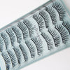A tray of handmade 3D mink false eyelashes in a light blue packaging.