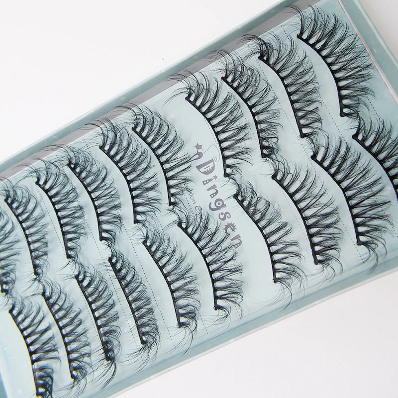 A tray of handmade 3D mink false eyelashes in a light blue packaging.