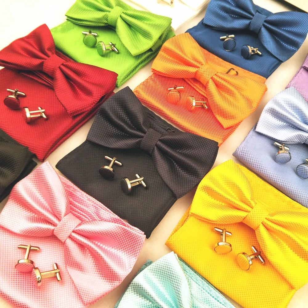 A collection of colorful bow ties and cufflinks arranged on a white background.