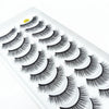 A display of dramatic mink false eyelashes on a white plastic tray.