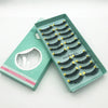 A box of handmade 3D mink false eyelashes with various styles displayed inside.