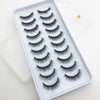 A tray of dramatic mink false eyelashes is displayed on a white background.