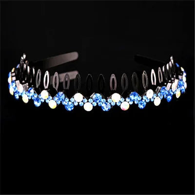 A close-up of a pearl and rhinestone anti-slip hairband for women displayed against a black background.