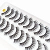 A strip of dramatic mink false eyelashes is shown, displaying various lash styles and lengths.