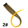 A bundle of golden blonde hair extensions with a clip-in attachment shown against a white background.
