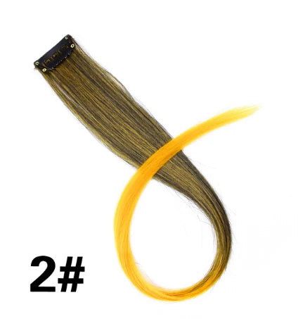 A bundle of golden blonde hair extensions with a clip-in attachment shown against a white background.