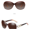 Braunrahmen-Sonnenbrille mit braunen Linsen in Profilansicht.
