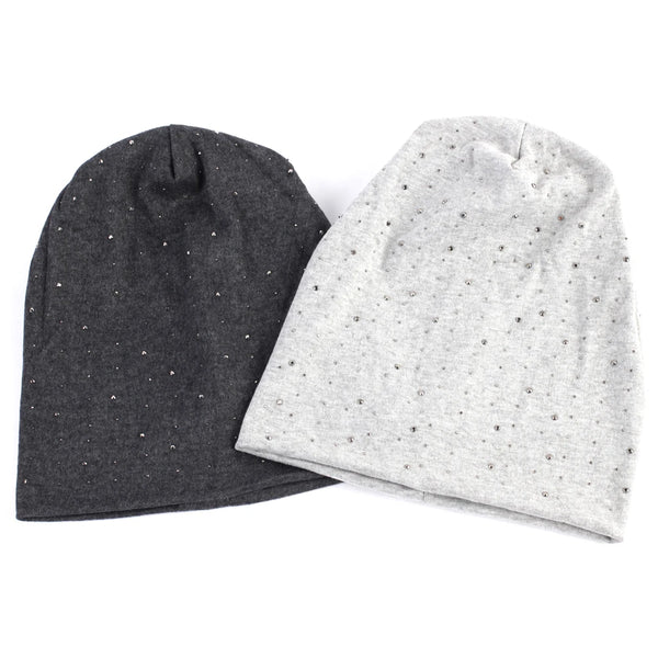 A gray and black rhinestone beanie hat shown folded, featuring small sparkling embellishments.