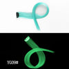 A spool of light aqua synthetic hair extensions coiled into a loop.
