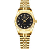 A gold-toned wristwatch with a black dial and gold accents on a yellow background.