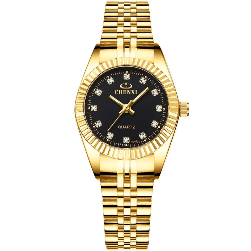 A gold-toned wristwatch with a black dial and gold accents on a yellow background.