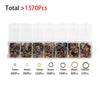A set of jewelry findings including clasps, hooks, and jump rings packaged in clear plastic compartments.
