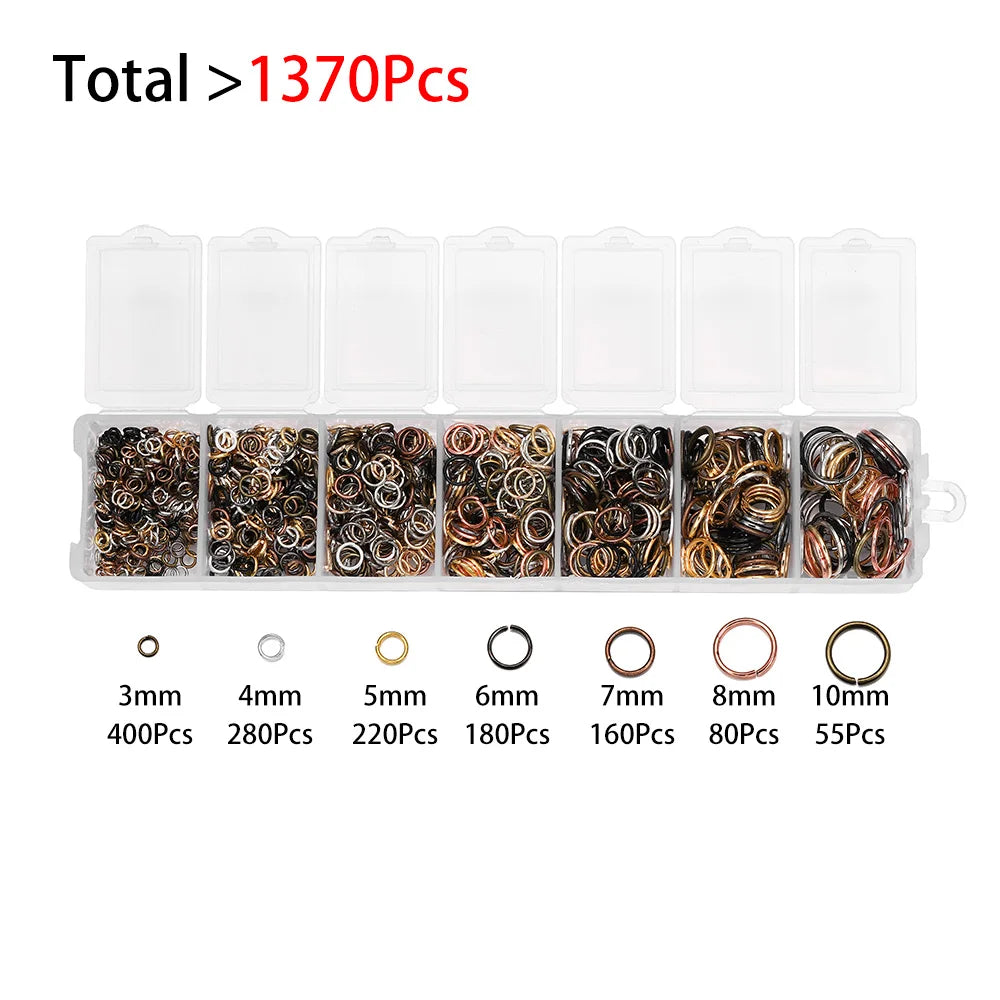 A set of jewelry findings including clasps, hooks, and jump rings packaged in clear plastic compartments.