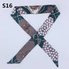 A patterned silk headband or scarf featuring a multi-color leopard print design.