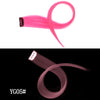 A bright pink, smooth synthetic hair extension is shown in a curved shape against a white background.