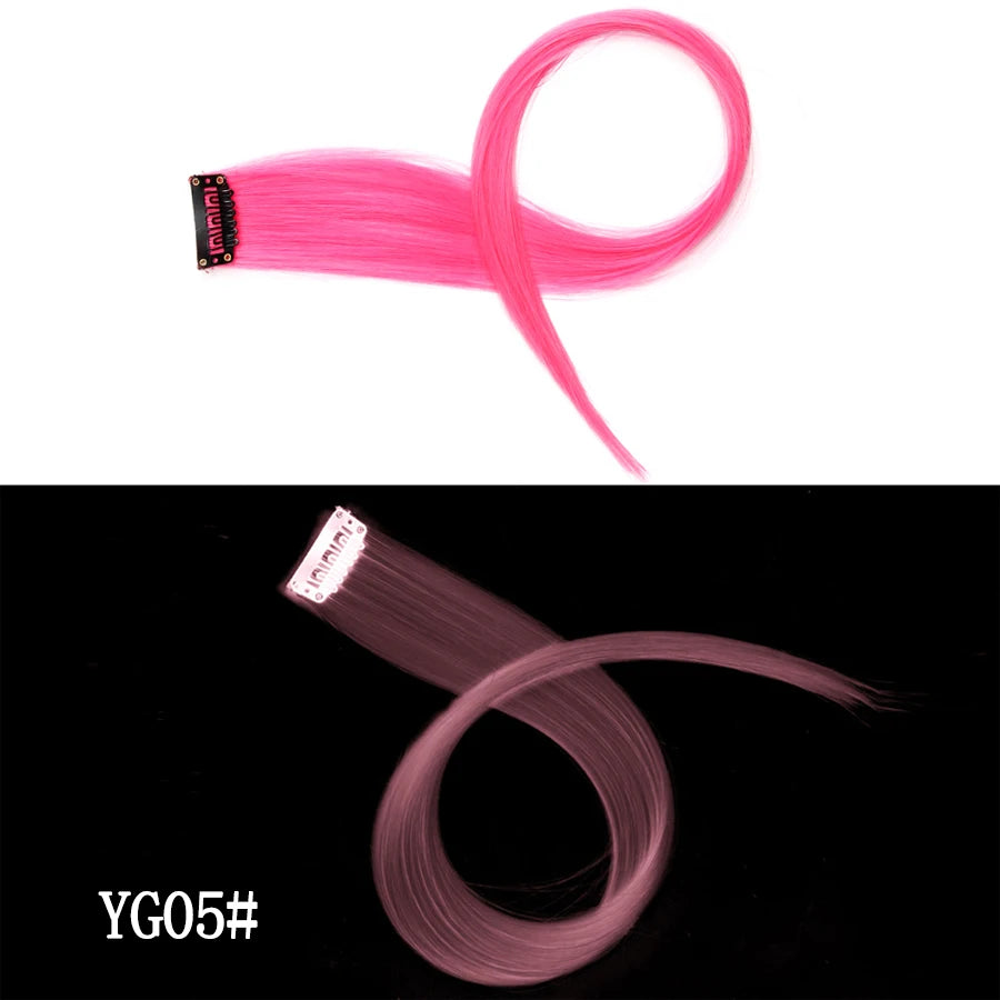 A bright pink, smooth synthetic hair extension is shown in a curved shape against a white background.
