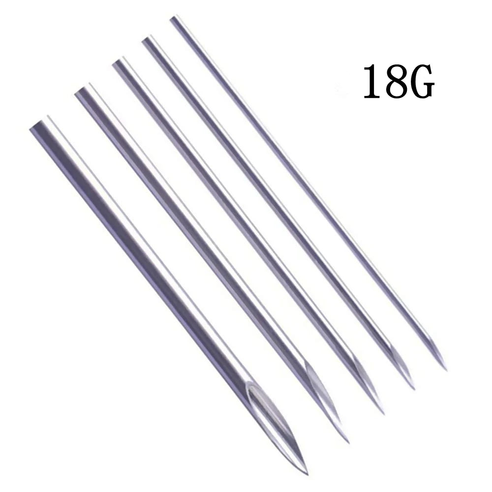 A set of 18 gauge disposable sterile piercing needles.