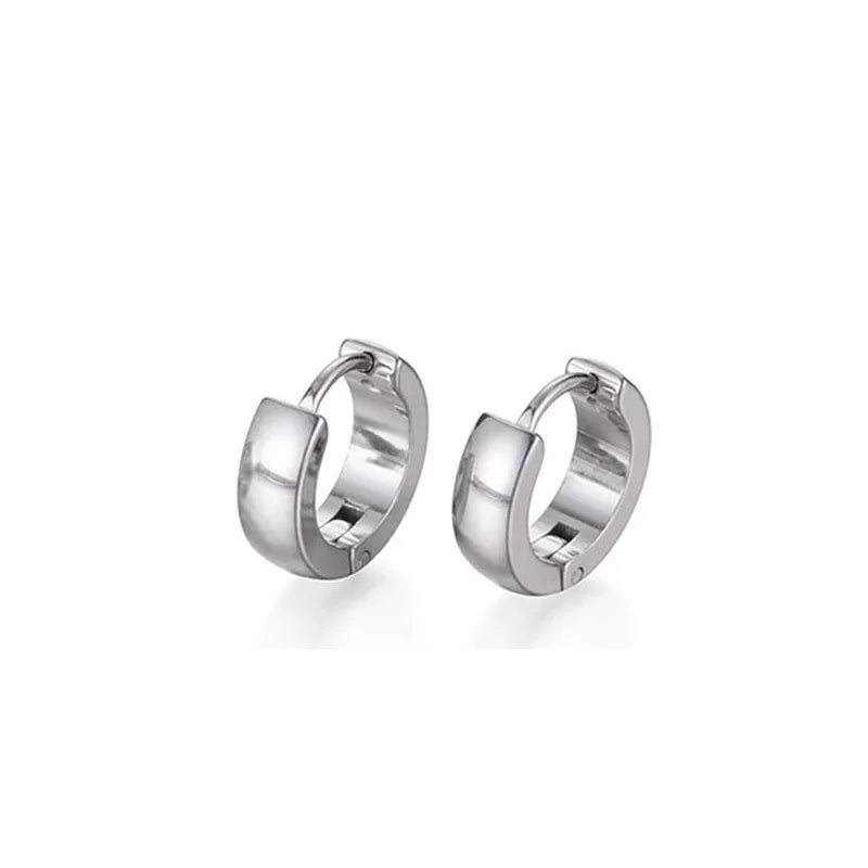 A pair of minimalist gold hoop earrings shown against a white background.