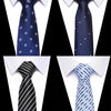 Three silk jacquard ties are displayed against a black background, showing blue patterned, black striped, and light blue patt