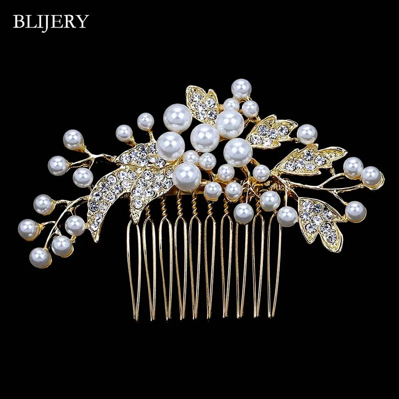 A delicate gold and pearl bridal hair comb featuring rhinestone accents.