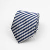 A navy blue and white striped necktie with a subtle dot pattern folded on a white background.